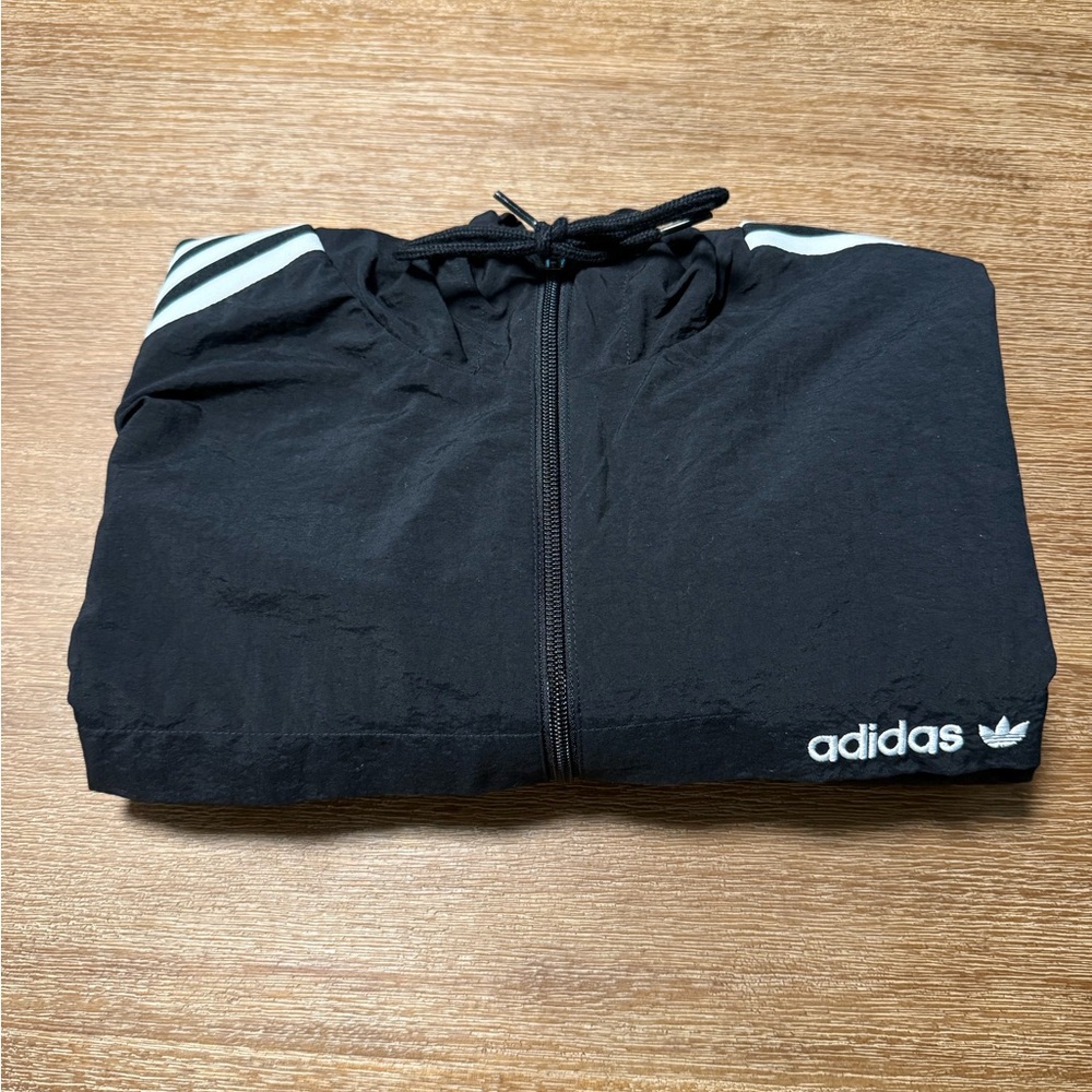 Adidas windbreaker jacket and a size extra large